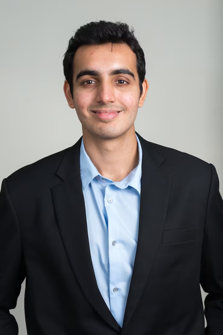 imgi_50_young-handsome-indian-businessman-suit-against-white-wall_251136-69020